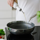 Wok auf dem Herd 